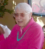 Dr. Jeanne Garrison in bright pink shirt